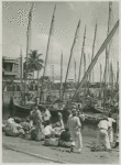 View of men and women on the docks