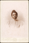 Studio portrait of a woman.