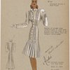 Fitted dressmaker's coat with round collar and stitched-down pleats.