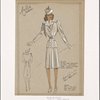 Fitted knee-length coat with military details.