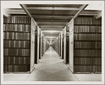 Photograph through center hallway of the stacks