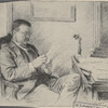 Theodore Roosevelt seated at a desk.