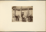 A group of military and civilian people