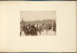 [A group of men in a sledge]