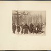 [A group of military and civilian people in a sledge]