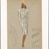 Fitted suit with two box pleats on front and back of jacket, and on front of skirt.