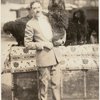 Alf Loyal holding one of his circus-trained dogs.