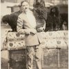 Alf Loyal holding one of his circus-trained dogs