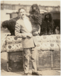 Alf Loyal holding one of his circus-trained dogs