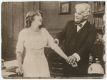 Mary Pickford and David Belasco in a scene from the motion picture A Good Little Devil.