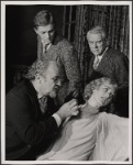 Jerome Dempsey, Valerie Mahaffey, Alan Coates and Dillon Evans in the 1977-80 Broadway revival of Dracula, sets by Edward Gorey