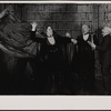 Alan Coates [obscured behind cape], Raul Julia, Jerome Dempsey and Dillon Evans in the 1977-80 Broadway revival of Dracula, sets by Edward Gorey