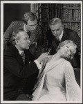 Peter Walker, Alan Coates, Dillon Evans and Valerie Mahaffey in the 1977-80 Broadway revival of Dracula, sets by Edward Gorey