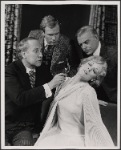 Peter Walker, Alan Coates, Valerie Mahaffey and Dillon Evans in the 1977-80 Broadway revival of Dracula, sets by Edward Gorey