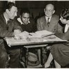 Carlton Moss (seocnd from left) with R.H. Gordon, Frank Schiffman, and Stella Garvin.