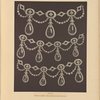 Diamond necklace with emerald pendants.