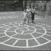 Location scouting contact sheets. Three children on an asphalt playground