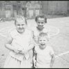 Location scouting contact sheets. Close up of three children on playground