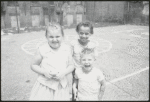 Location scouting contact sheets. Close up of three children on playground