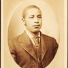 Studio portrait of a young man wearing tie and stick pin.
