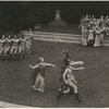 Outdoor performance by students of the Bennett School featuring two groups of four dancers in short tunics and black short wigs