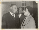 Martin Luther King, Jr. (left) and Eslanda Goode Robeson (right) attending a gathering at the African Unity House, sponsored by the Afro-Asian West Indian Community, in London, England, on October 30, 1961