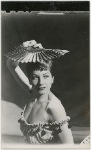 Publicity photograph of Zizi Jeanmaire with fan