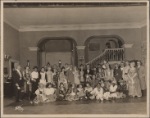 A "fancy dress party" in honor of Jane Cowl by the cast of the stage production Easy Virtue: Noel Coward standing with Miss Cowl in the center of the group. From left to Right, standing: Mr. Algara, Elizabeth Ann Tucker, Roland Young, Marda Vanne, Mr. Keighley, Marjorie Kummer, Mrs. Footman, John Perry, Robert Harris, Joan Clement Scott, Noel Coward, Jane Cowl, Willard Joray, Mr. Footman, Vernon Kelso, Nancie Marsland, Jeannette White, Claggett Wilson, Robert McGroarty, Lord Kew, C. Bailey Hick, Dennis Clough, Allan Hollis, Mabel Terry Lewis, Halliwell Hobbes. Seated: Constance Best, Mrs. Walter H. Knapp, Joyce Carey, Marion Evensen, Phyllis Connard, Mary Heberden, Louis Hector, John Langan, Alma Reeves Smith, Katherine Wray and Albert Bliss.