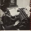 woman working at a typewriter