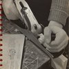 man using a wood plane