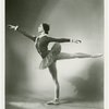 Studio portrait of Jillana posed in arabesque in costume for "Fanfare".