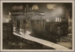 [The high point of the sixth anniversary of (the National Socialists') coming to power was the great torchlight parade of the formations in Berlin.  The parade marches through the Brandenburg Gate.]