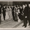 The solidarity between the Fuhrer and German artists showed itself in the reception held in the new Reichs Chancellery.  The Fuhrer shows his guests the great reception hall