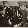 [The warm friendship between Japan and Germany finds expression in a Japanese art exhibition in Berlin.  The Fuhrer greets Japanese Ambassador Oshima.]