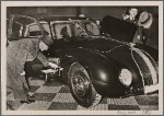 One of the most admired cars at the Automobile Show is the streamlined Horch V930.  It is equipped with a fold-out wash basin on the side.