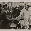 [The International Automobile show is opened by the Fuhrer.  He greets expert German drivers in front of the Reichs-chancellery.]