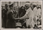 [The International Automobile show is opened by the Fuhrer.  He greets expert German drivers in front of the Reichs-chancellery.]