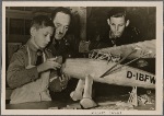 Some hoped that Germany's air strength would be crippled.  But in the Reich, all age groups of the coming generation saw to it that Germany was not only equipped for the present war, but had become a nation of fliers.  In a National Socialist Flying Corps workshop the little ones tinker with airplane models.