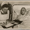 Because the wounded one's hand cannot do so, the nurse from the German Red Cross writes a letter to his parents and wife.  In a thousand small ways the homeland shows its thanks to its soldiers.]