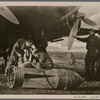 Ground crewmen from the Italian bomber squadrons on the Channel coast prepare for a mission against England, which has suffered devastating attacks in the past weeks against cities producing vital war materials.