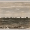 A fiery blockade of England!  Like a curtain of iron the fire from German coastal guns falls across the entrance to a Channel harbor.  No English ship can get through this
