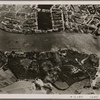 [...German bombs fall on strategic installations.  What show up in this picture as massive structures and huge complexes were, 48 hours later, an unbroken sea of rubble and flames.  London lived through what a neutral corrspondent called "apocalyptic nights".]