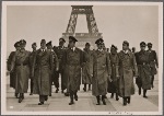 [The Fuhrer inspects Paris, which has quickly returned to normal life under German occupation troops.  At the Fuhrer's side are professors Giesler, Speer and Breker.  In the background is the Eiffel Tower.]