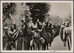 Defended by the supposedly-impregnable Maginot Line, the French hadn't planned for this outcome.  The Poilus line up in Sedan with their hands up, ready to be transported to the prisoner-of-war camps.