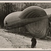 The artillery on the Westwall stands watch.  On clear days an artillery observer ascends in a captive balloon to direct (the guns') fire