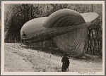[The artillery on the Westwall stands watch.  On clear days an artillery observer ascends in a captive balloon to direct (the guns') fire.]
