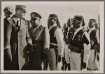 Chief of Staff Lutze visits the new Italian settlements in Libya. The Chief of Staff and His Excellency Russo inspect ranks of Askaris (native soldiers) in Nalut.
