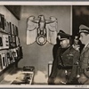 Il Duce visits the German Book Exposition in the Mercati Trajani in Rome.  Landesgruppenleiter Ettel explains to Mussolini some particular works representative of German literature.