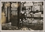 England has begun to experience anxious days because of bomb attacks by the Irish Republican Army.  Our picture shows a shop badly damaged by a bomb.