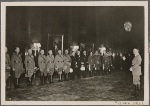 Adolf Hitler honored military leaders.  In our picture the Fuhrer speaks to his generals.